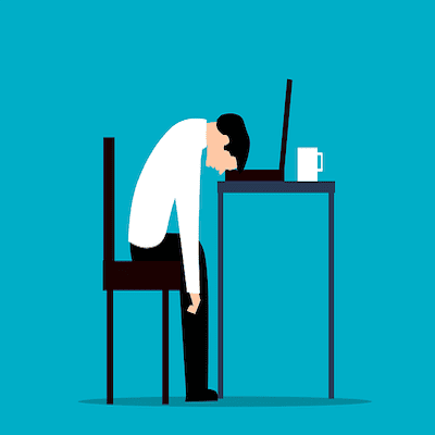 A picture of a person burned out and tired.