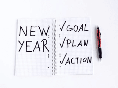 A picture of a new year journal of goals.